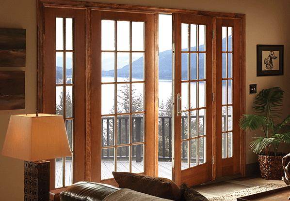 Interior view of a house with large wooden French doors